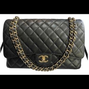 Chanel Double Flap Maxi Classic Black Caviar Shoulder Bag
13"L x 33.75"W x 9"H